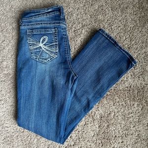 Bootcut Mid-Rise Insta Stretch Juniors Jeans.
